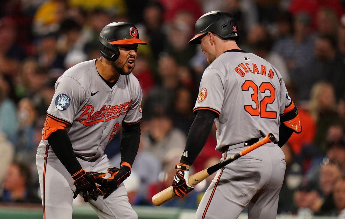 Sep 11, 2024; Boston, Massachusetts, USA; Baltimore Orioles designated hitter Anthony Santander (25) reacts with first baseman Ryan O'Hearn (32) after hitting a home run against the Boston Red Sox in the eighth inning at Fenway Park. Mandatory Credit: David Butler II-Imagn Images