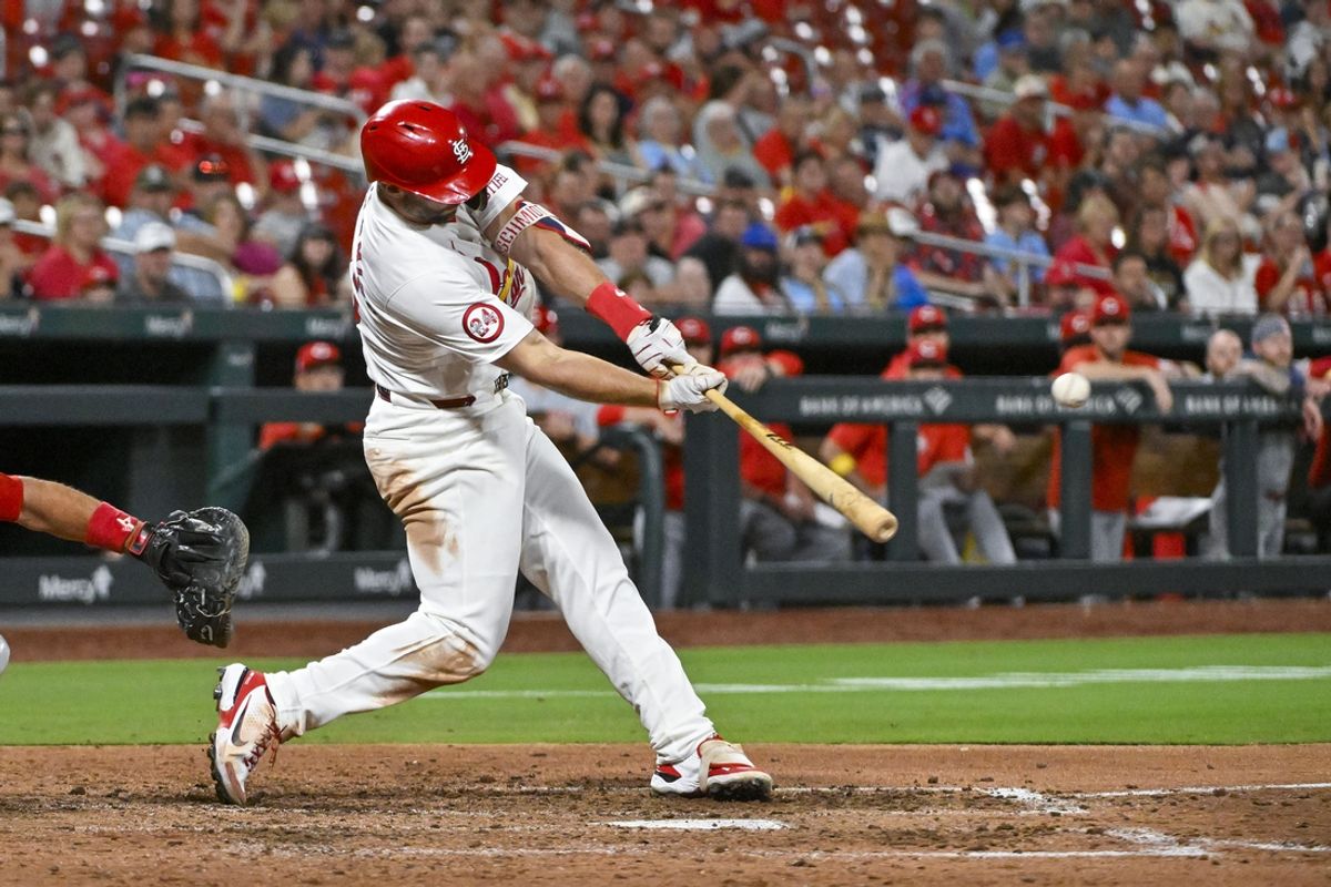 Sep 11, 2024; St. Louis, Missouri, USA;  St. Louis Cardinals first baseman Paul Goldschmidt (46) hits a go ahead one run double against the Cincinnati Reds during the eighth inning at Busch Stadium. Mandatory Credit: Jeff Curry-Imagn Images