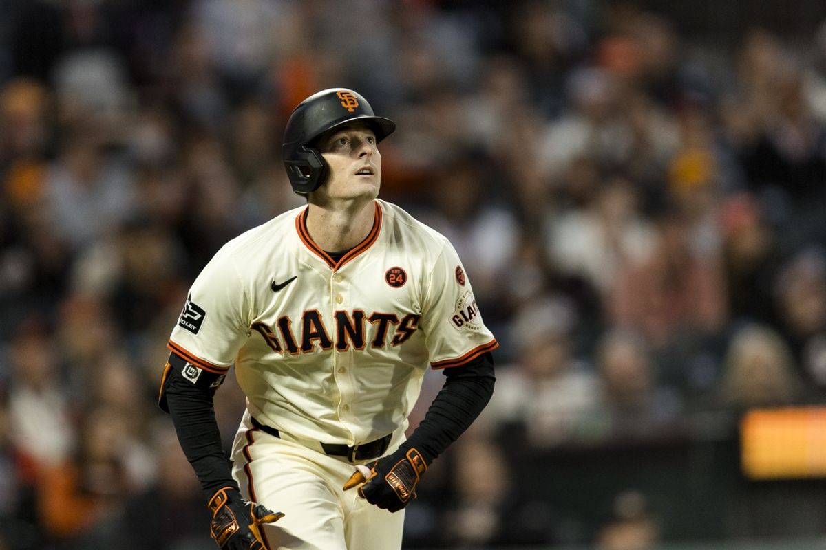 Sep 11, 2024; San Francisco, California, USA; San Francisco Giants right fielder Mike Yastrzemski (5) hits a three-run home run against the Milwaukee Brewers during the second inning at Oracle Park. Mandatory Credit: John Hefti-Imagn Images