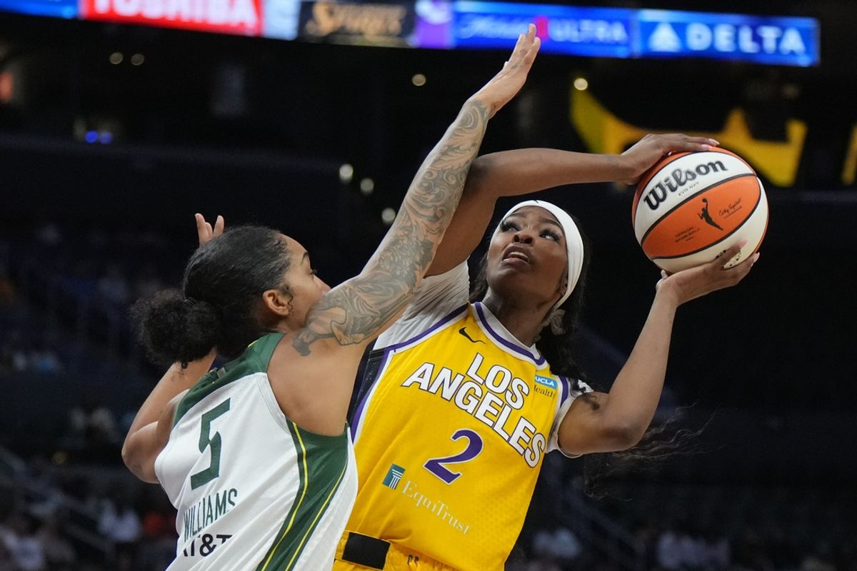 Sep 11, 2024; Los Angeles, California, USA; LA Sparks forward Rickea Jackson (2) is defended by Seattle Storm forward Gabby Williams (5) in the first half at Crypto.com Arena. Mandatory Credit: Kirby Lee-Imagn Images