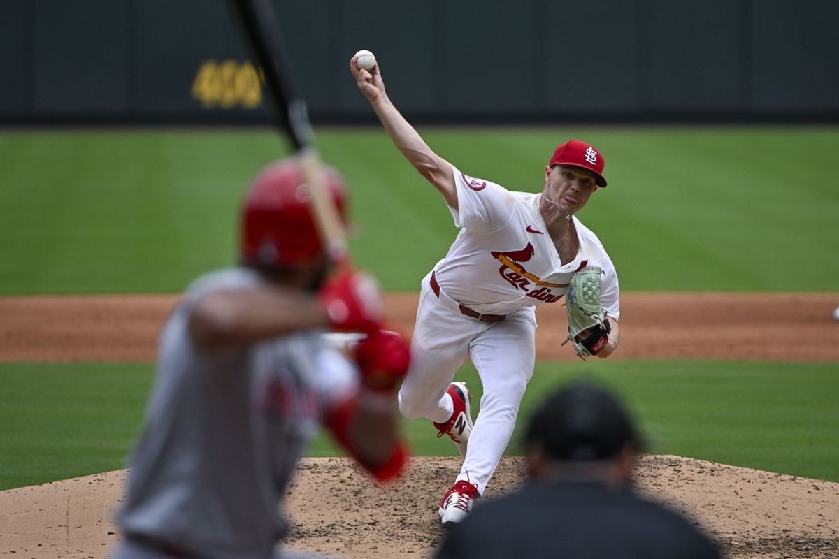 Sep 12, 2024; St. Louis, Missouri, USA;  St. Louis Cardinals starting pitcher Sonny Gray (54) pitches against Cincinnati Reds pinch hitter Amed Rosario (38) during the sixth inning at Busch Stadium. Mandatory Credit: Jeff Curry-Imagn Images