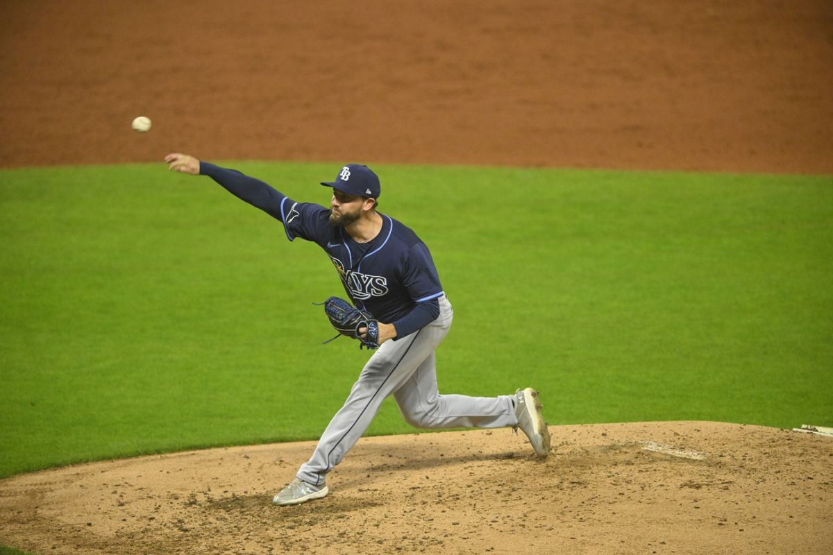 Sep 12, 2024; Cleveland, Ohio, USA; Tampa Bay Rays relief pitcher Cole Sulser (71) delivers a pitch in the third inning against the Cleveland Guardians at Progressive Field. Mandatory Credit: David Richard-Imagn Images