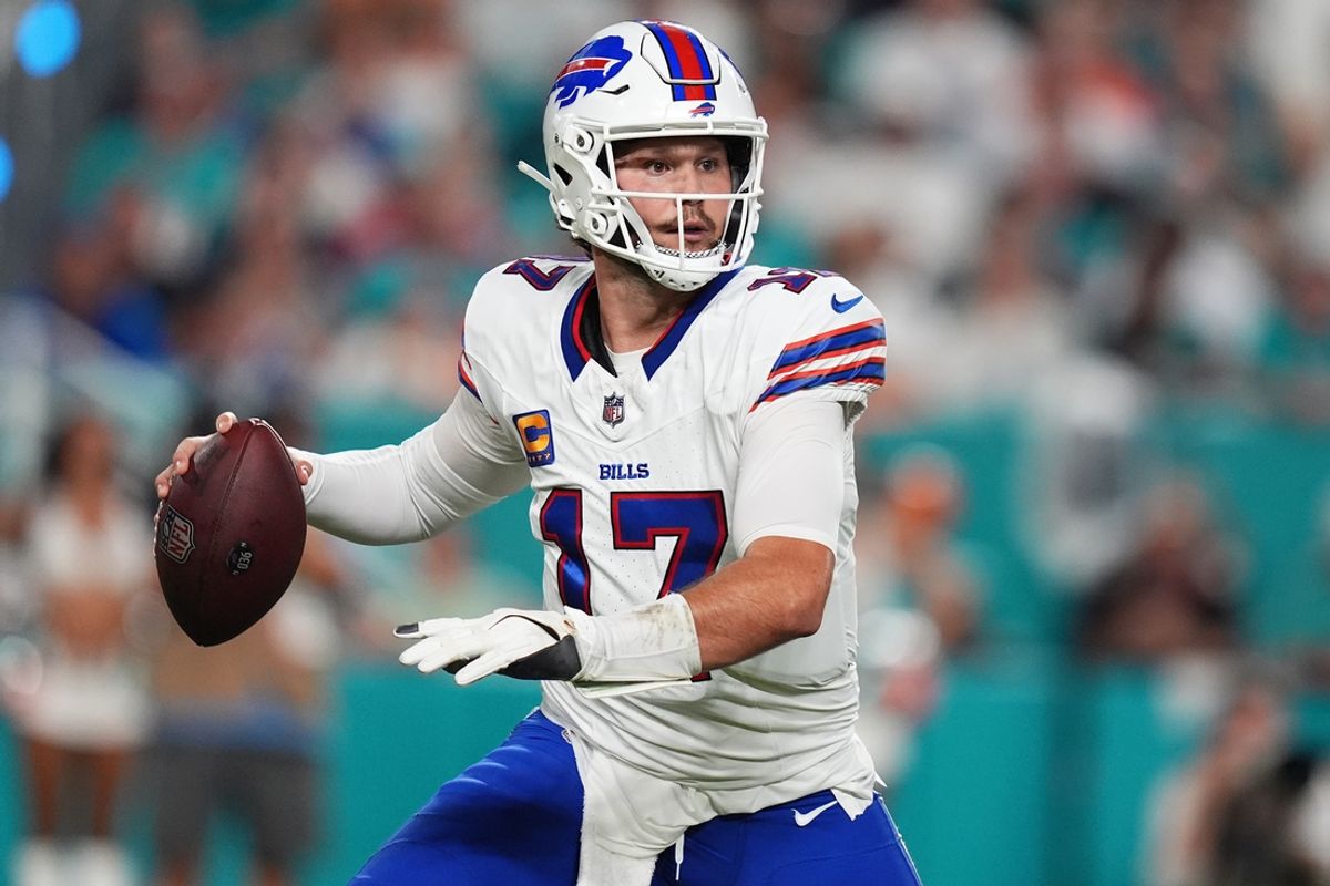 Sep 12, 2024; Miami Gardens, Florida, USA; Buffalo Bills quarterback Josh Allen (17) attempts a pass against the Miami Dolphins during the first half at Hard Rock Stadium. Mandatory Credit: Jasen Vinlove-Imagn Images