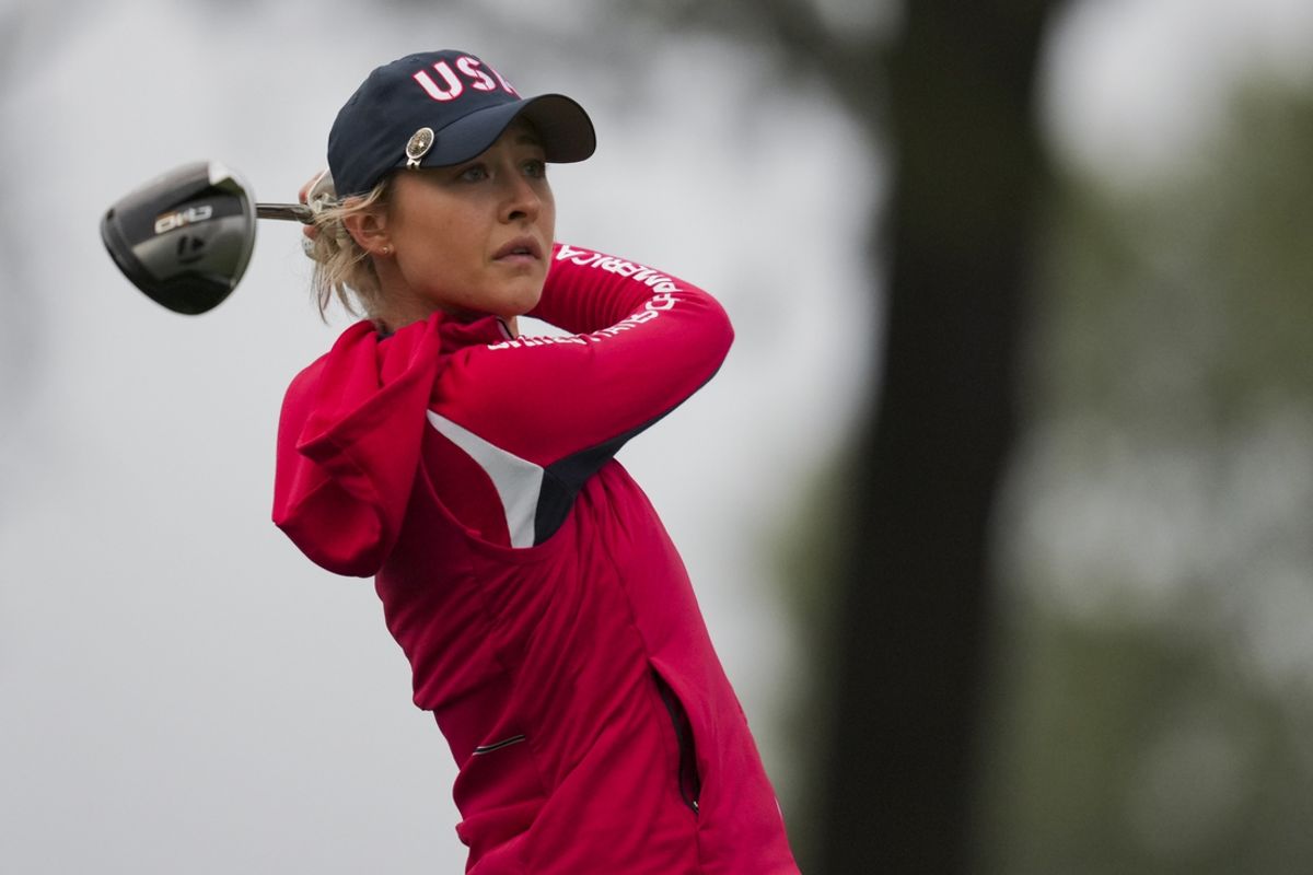 Sep 13, 2024; Gainesville, Virginia, USA; Nelly Korda of Team USA lines plays a shot from the second tee during Foursomes matches against Team Europe during the first round of the Solheim Cup 2024 at Robert Trent Jones Golf Club. Mandatory Credit: Aaron Doster-Imagn Images