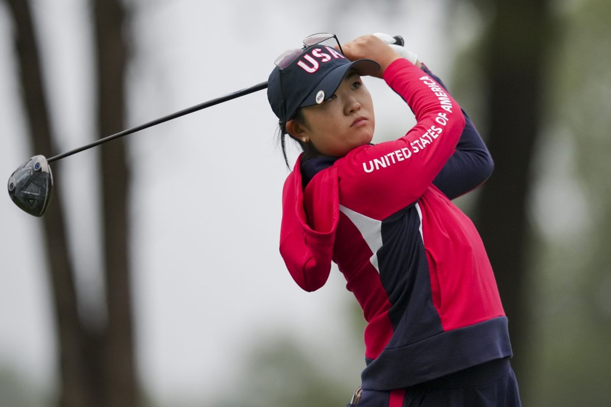 Sep 13, 2024; Gainesville, Virginia, USA; Rose Zhang of Team USA plays a shot from the second tee during Foursomes matches against Team Europe during the first round of the Solheim Cup 2024 at Robert Trent Jones Golf Club. Mandatory Credit: Aaron Doster-Imagn Images