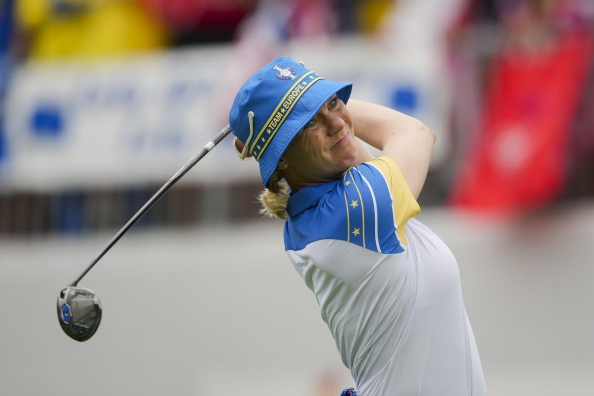 Sep 13, 2024; Gainesville, Virginia, USA; Madelene Sagstrom of Team Europe plays her shot from the first tee during Foursomes matches against Team USA during the first round of the Solheim Cup 2024 at Robert Trent Jones Golf Club. Mandatory Credit: Aaron Doster-Imagn Images