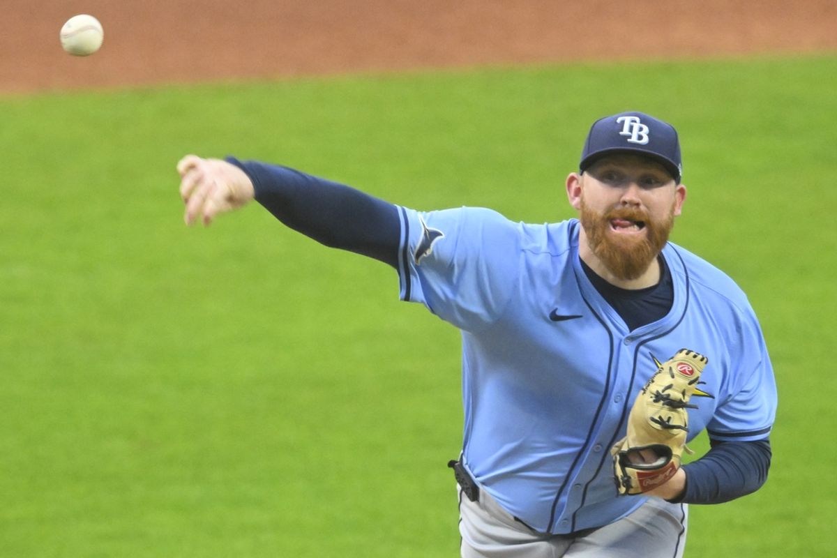 Sep 13, 2024; Cleveland, Ohio, USA; Tampa Bay Rays starting pitcher Zack Littell (52) delivers a pitch in the first inning against the Cleveland Guardians at Progressive Field. Mandatory Credit: David Richard-Imagn Images