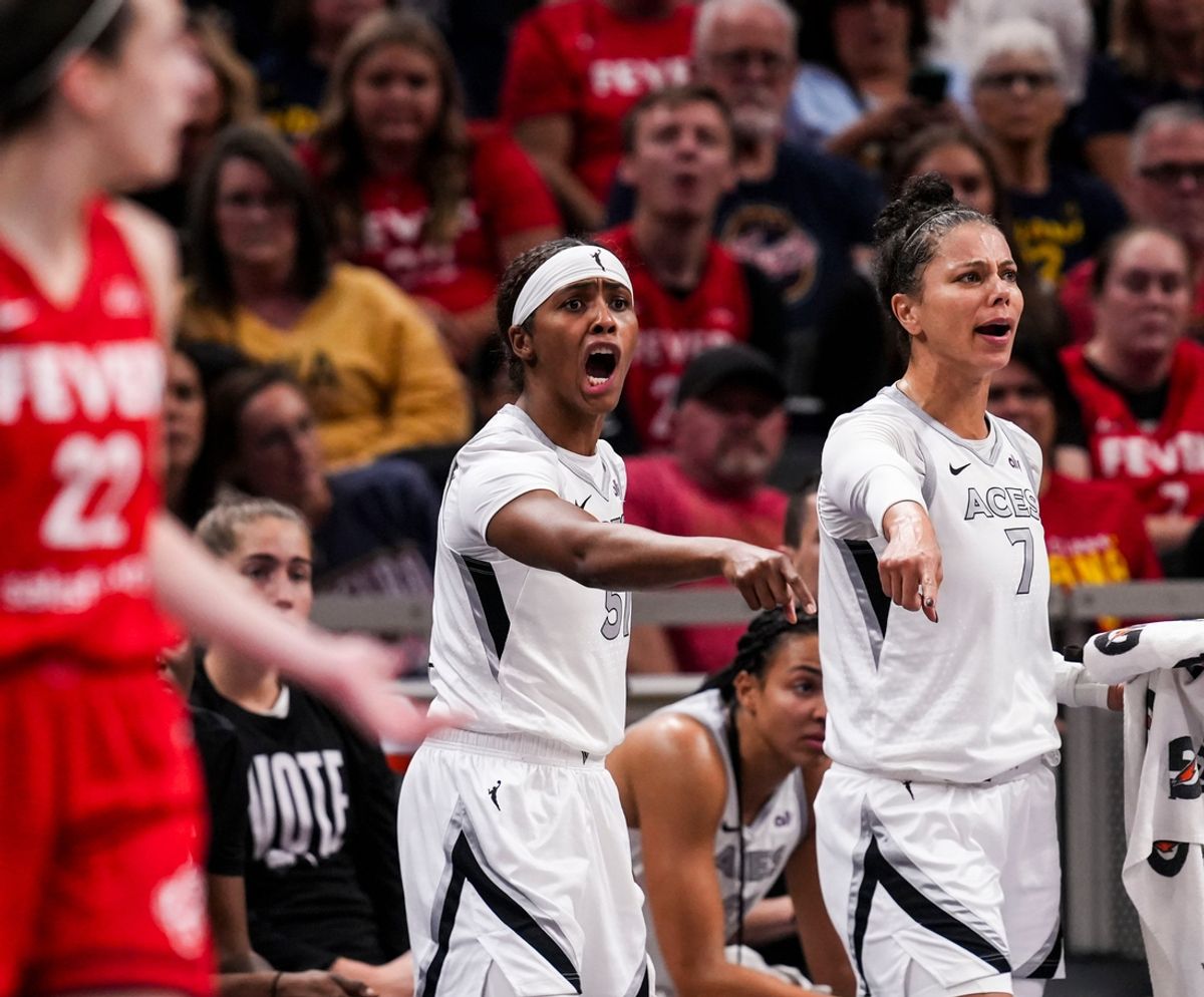 Las Vegas Aces guard Sydney Colson (51) and Las Vegas Aces forward Alysha Clark (7) reacts to a call Friday, Sept. 13, 2024, during a game between the Indiana Fever and the Las Vegas Aces on Friday, Sept. 13, 2024, at Gainbridge Fieldhouse in Indianapolis.