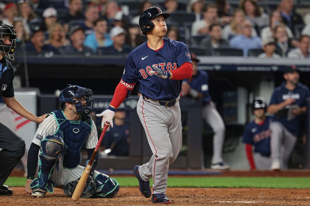 Sep 13, 2024; Bronx, New York, USA; Boston Red Sox left fielder Masataka Yoshida (7) hits a two run home run during the sixth inning against the New York Yankees at Yankee Stadium. Mandatory Credit: Vincent Carchietta-Imagn Images