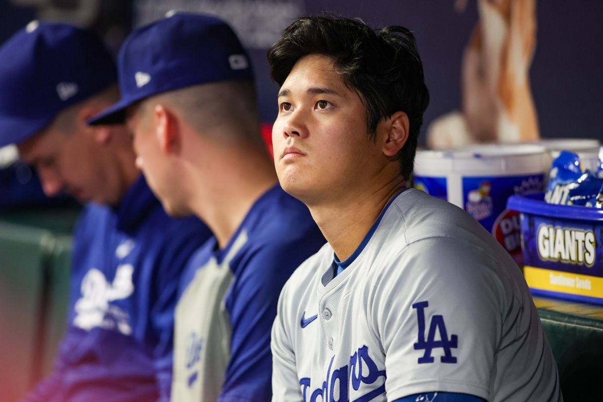 Sep 13, 2024; Atlanta, Georgia, USA; Los Angeles Dodgers designated hitter Shohei Ohtani (17) in the dugout against the Atlanta Braves in the seventh inning at Truist Park. Mandatory Credit: Brett Davis-Imagn Images