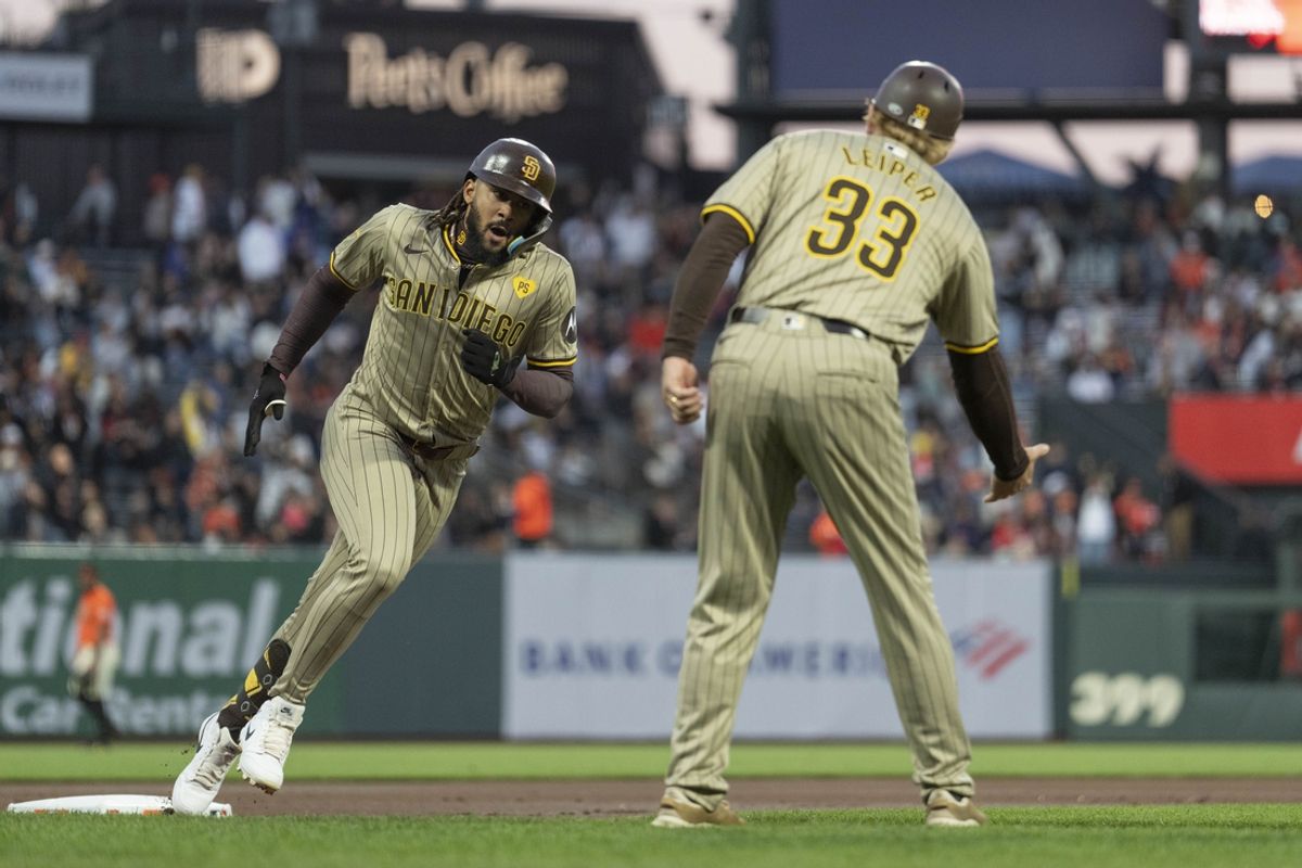 Sep 13, 2024; San Francisco, California, USA;  San Diego Padres outfielder Fernando Tatis Jr. (23) rounds third base after hitting a two run homerun during the first inning against the San Francisco Giants at Oracle Park. Mandatory Credit: Stan Szeto-Imagn Images