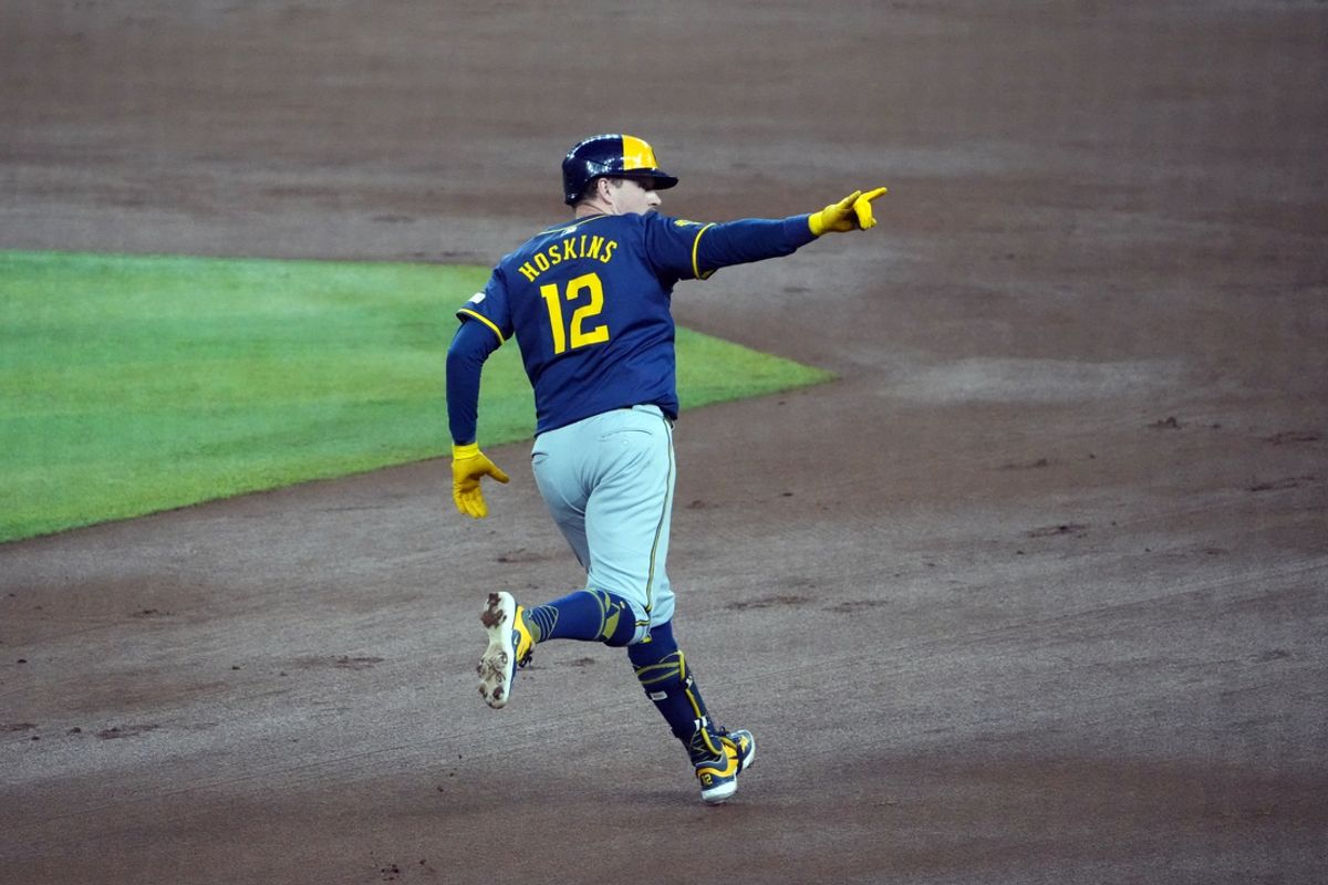 Sep 13, 2024; Phoenix, Arizona, USA; Milwaukee Brewers first base Rhys Hoskins (12) runs the bases after hitting a two run home run against the Arizona Diamondbacks during the fourth inning at Chase Field. Mandatory Credit: Joe Camporeale-Imagn Images