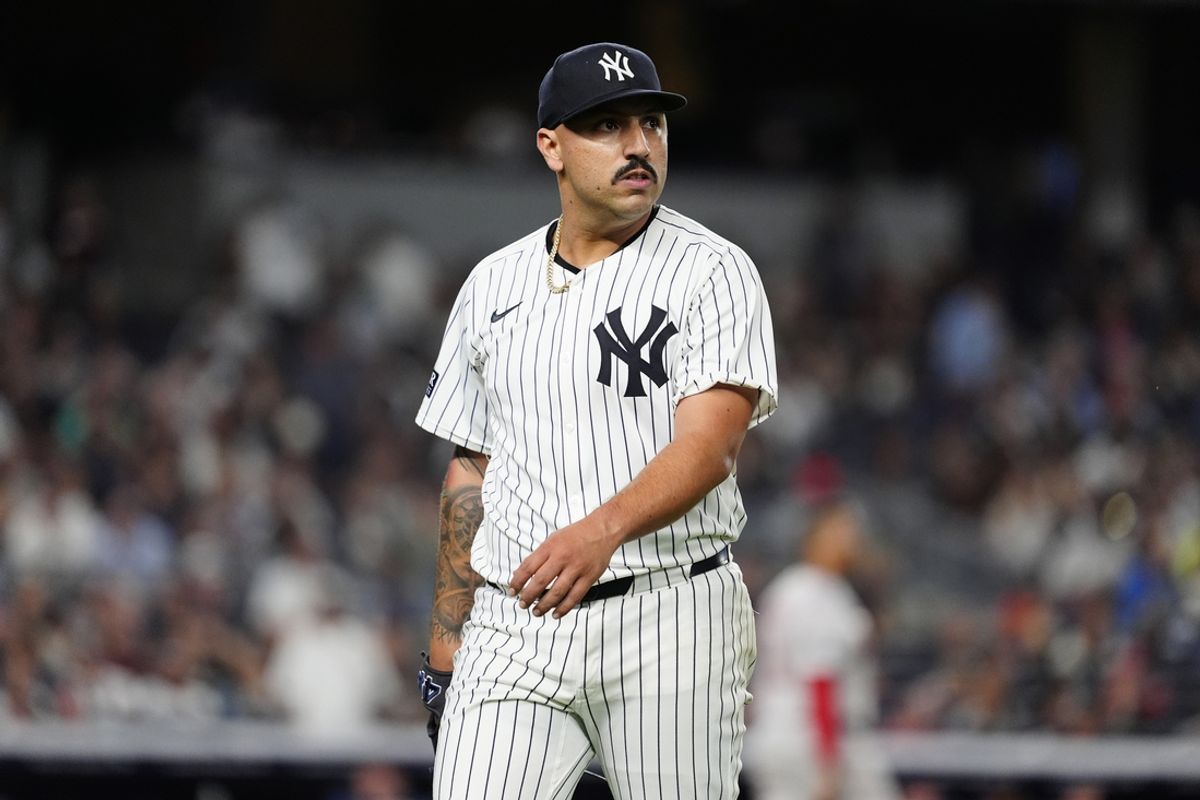 Sep 12, 2024; Bronx, New York, USA; New York Yankees pitcher Nestor Cortes (65) walks to the dugout in the middle of the fifth inning against the Boston Red Sox at Yankee Stadium. Mandatory Credit: Gregory Fisher-Imagn Images