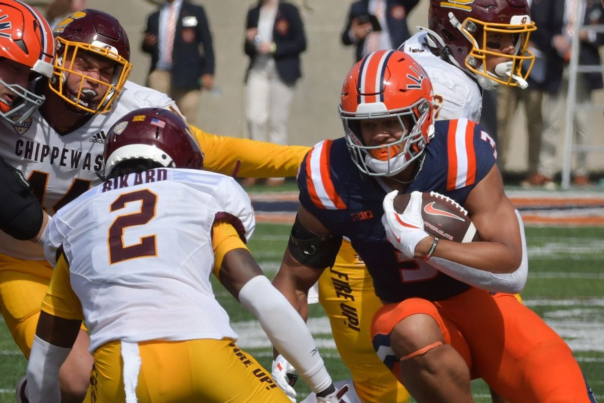 Sep 14, 2024; Champaign, Illinois, USA;  Illinois Fighting Illini running back Kaden Feagin (3) runs the ball against the Central Michigan Chippewas during the first half at Memorial Stadium. Mandatory Credit: Ron Johnson-Imagn Images