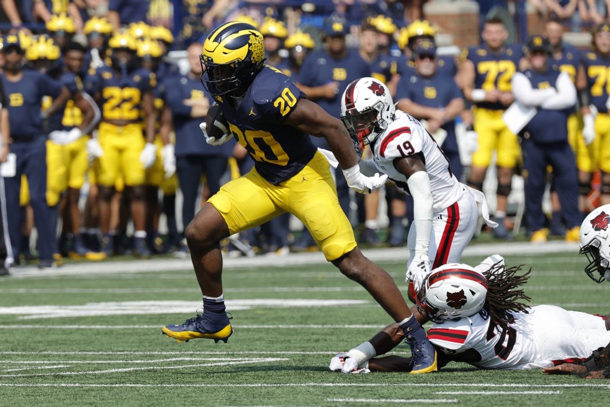 Sep 14, 2024; Ann Arbor, Michigan, USA;  Michigan Wolverines running back Kalel Mullings (20) runs the ball against the Arkansas State Red Wolves during the first half at Michigan Stadium. Mandatory Credit: Rick Osentoski-Imagn Images