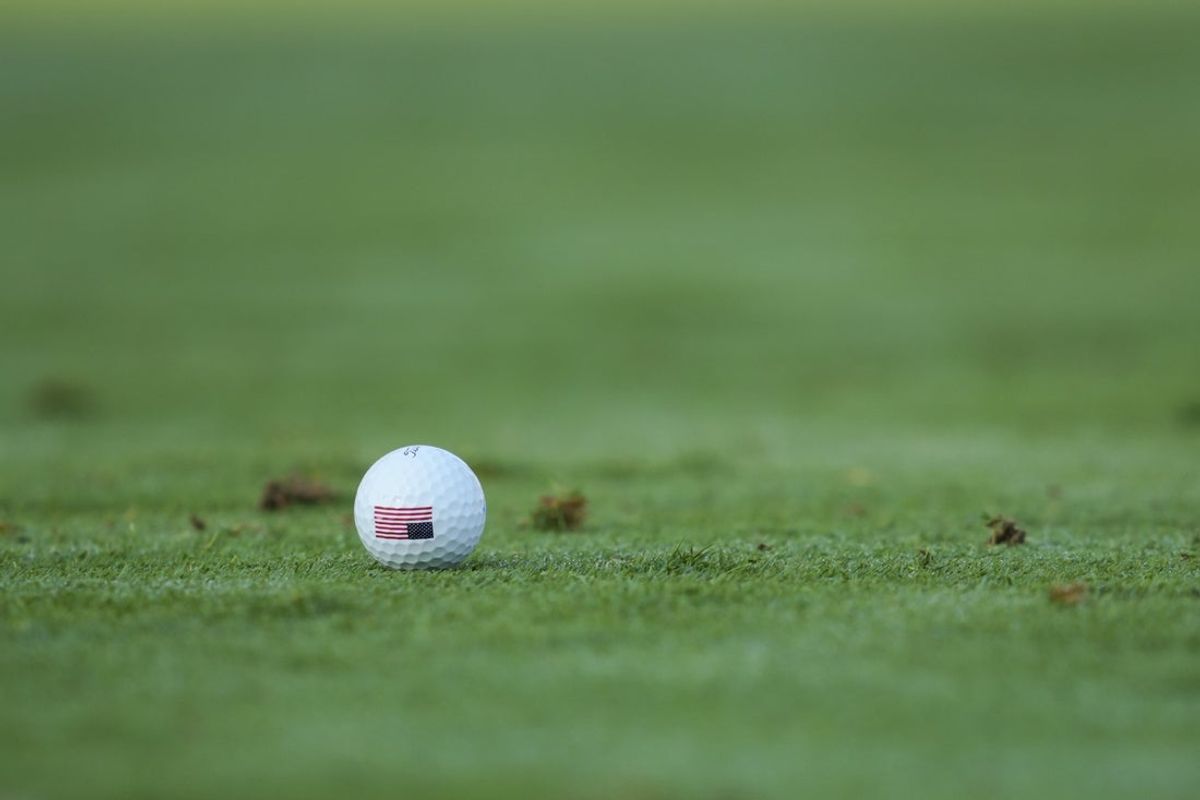 Sep 14, 2024; Gainesville, Virginia, USA; The American Flag is seen on a golf ball during Foursomes matches between Team Europe and Team USA during the second round of the Solheim Cup 2024 at Robert Trent Jones Golf Club. Mandatory Credit: Aaron Doster-Imagn Images