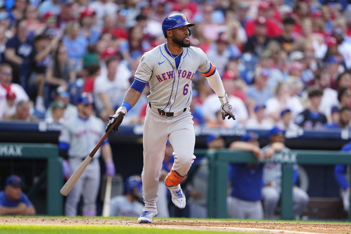 Sep 14, 2024; Philadelphia, Pennsylvania, USA; New York Mets right fielder Starling Marte (6) watches his RBI triple against the Philadelphia Phillies during the third inning at Citizens Bank Park. Mandatory Credit: Gregory Fisher-Imagn Images