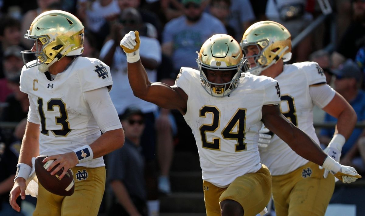 Notre Dame Fighting Irish quarterback Riley Leonard (13) celebrates after scoring a touchdown Saturday, Sept. 14, 2024, during the NCAA football game against the Purdue Boilermakersat Ross-Ade Stadium in West Lafayette, Ind.