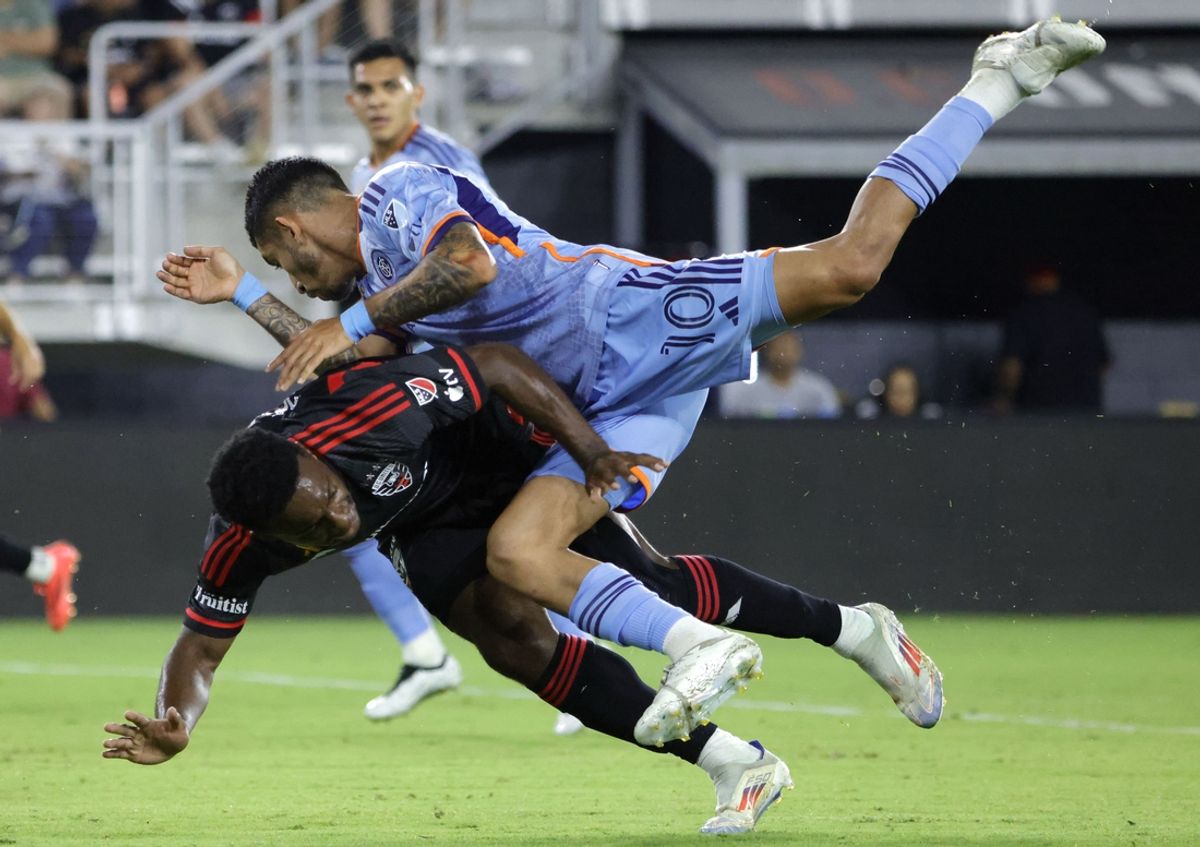Sep 14, 2024; Washington, District of Columbia, USA; D.C. United forward Cristian Dajome (11) and New York City FC forward Santiago Rodriguez (10) collide during the first half at Audi Field. Mandatory Credit: Amber Searls-Imagn Images