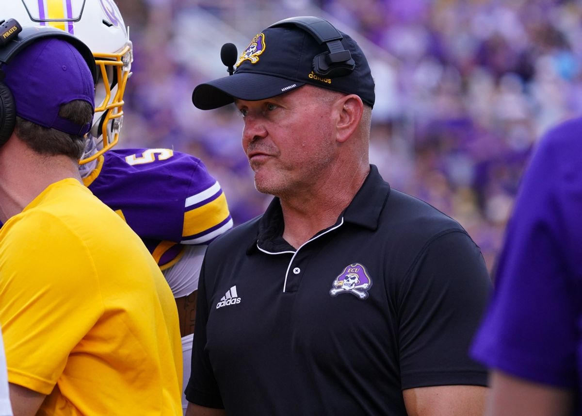 Sep 14, 2024; Greenville, North Carolina, USA;  East Carolina Pirates head coach Mike Houston looks on against the Appalachian State Mountaineers during the first half at Dowdy-Ficklen Stadium. Mandatory Credit: James Guillory-Imagn Images
