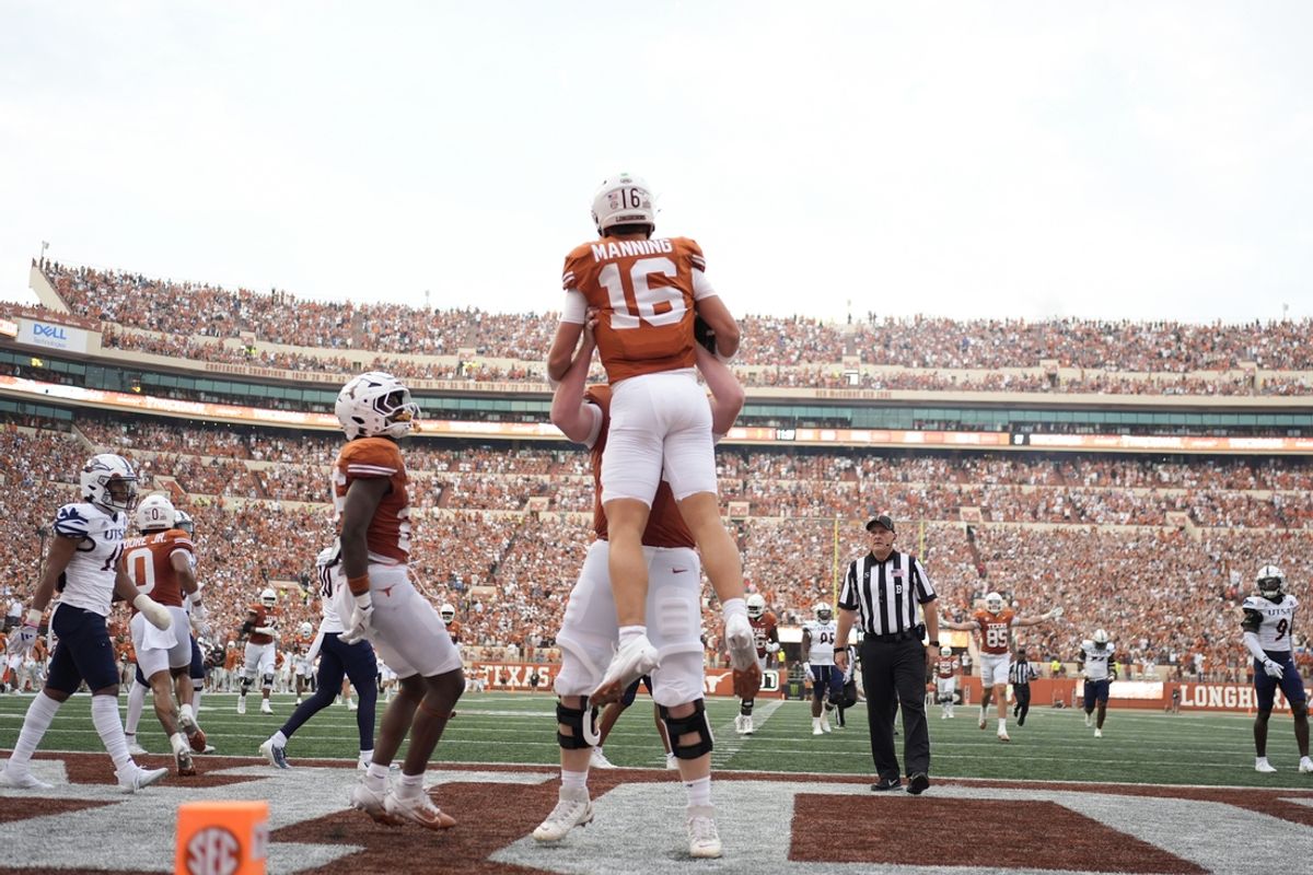Sep 14, 2024; Austin, Texas, USA; Texas Longhorns quarterback Arch Manning (16) reacts after scoring a touchdown during the first half against the Texas-San Antonio Roadrunners at Darrell K Royal-Texas Memorial Stadium. Mandatory Credit: Scott Wachter-Imagn Images