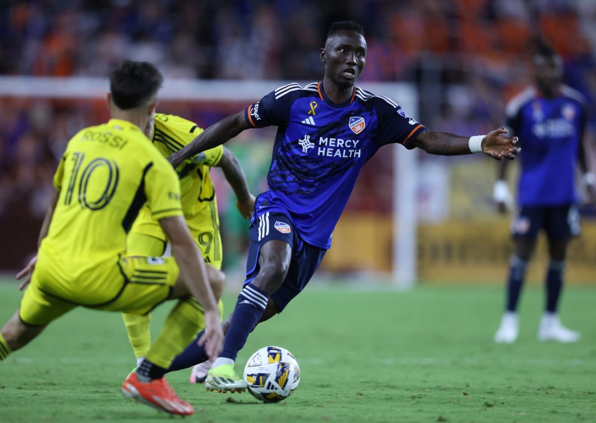 Sep 14, 2024; Cincinnati, Ohio, USA; FC Cincinnati midfielder Obinna Nwobodo (5) dribbles downfield during the second half against the Columbus Crew at TQL Stadium. Mandatory Credit: Joseph Maiorana-Imagn Images
