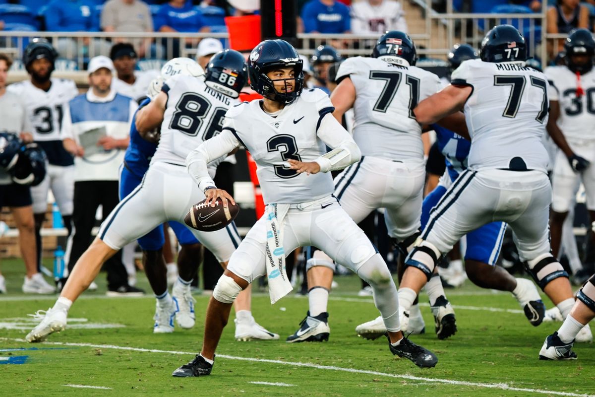 Sep 14, 2024; Durham, North Carolina, USA; Connecticut Huskies quarterback Nick Evers (3) prepares to throw the football during the first half of the game against Duke Blue Devils at Wallace Wade Stadium. Mandatory Credit: Jaylynn Nash-Imagn Images