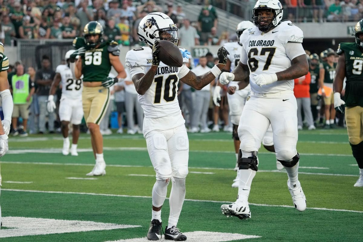 Sep 14, 2024; Fort Collins, Colorado, USA; Colorado Buffaloes wide receiver LaJohntay Wester (10) celebrates his second quarter touchdown against the Colorado State Rams at Sonny Lubick Field at Canvas Stadium. Mandatory Credit: Michael Madrid-Imagn Images