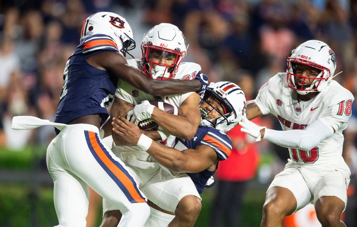 New Mexico Lobos running back Javen Jacobs (21) is taken down on a punt return as Auburn Tigers take on New Mexico Lobos at Jordan-Hare Stadium in Auburn, Ala., on Saturday, Sept. 14, 2024. Auburn Tigers lead New Mexico Lobos 17-13 at halftime.