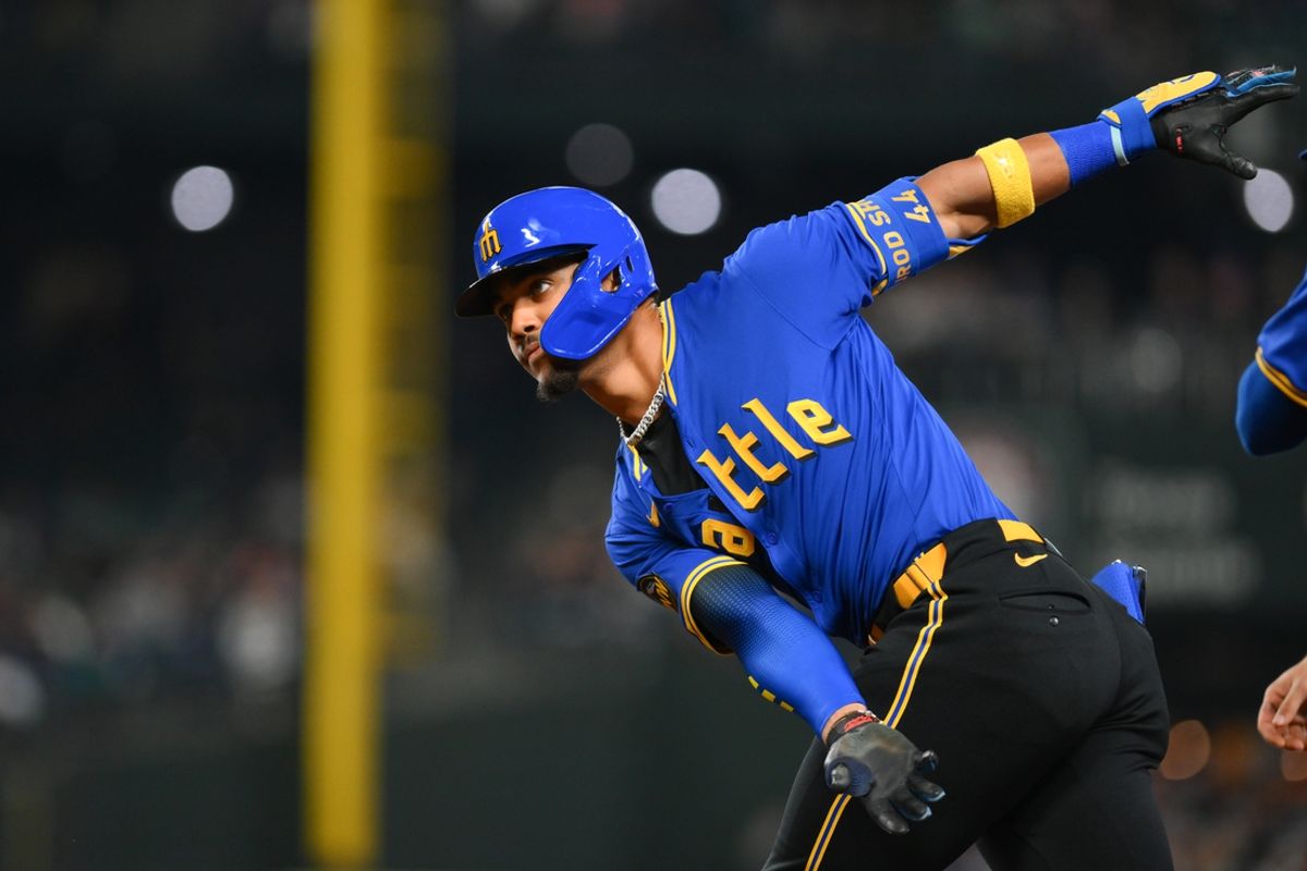 Sep 14, 2024; Seattle, Washington, USA; Seattle Mariners center fielder Julio Rodriguez (44) celebrates after hitting a single against the Texas Rangers during the first inning at T-Mobile Park. Mandatory Credit: Steven Bisig-Imagn Images