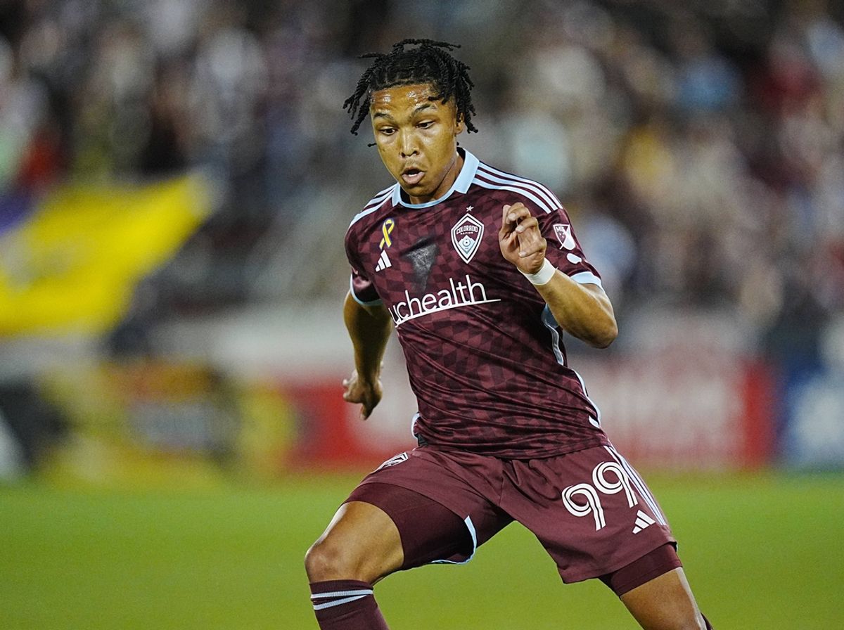 Sep 14, 2024; Commerce City, Colorado, USA; Colorado Rapids defender Jackson Travis (99) runs downfield during the first half against the Portland Timbers at Dick's Sporting Goods Park. Mandatory Credit: Ron Chenoy-Imagn Images