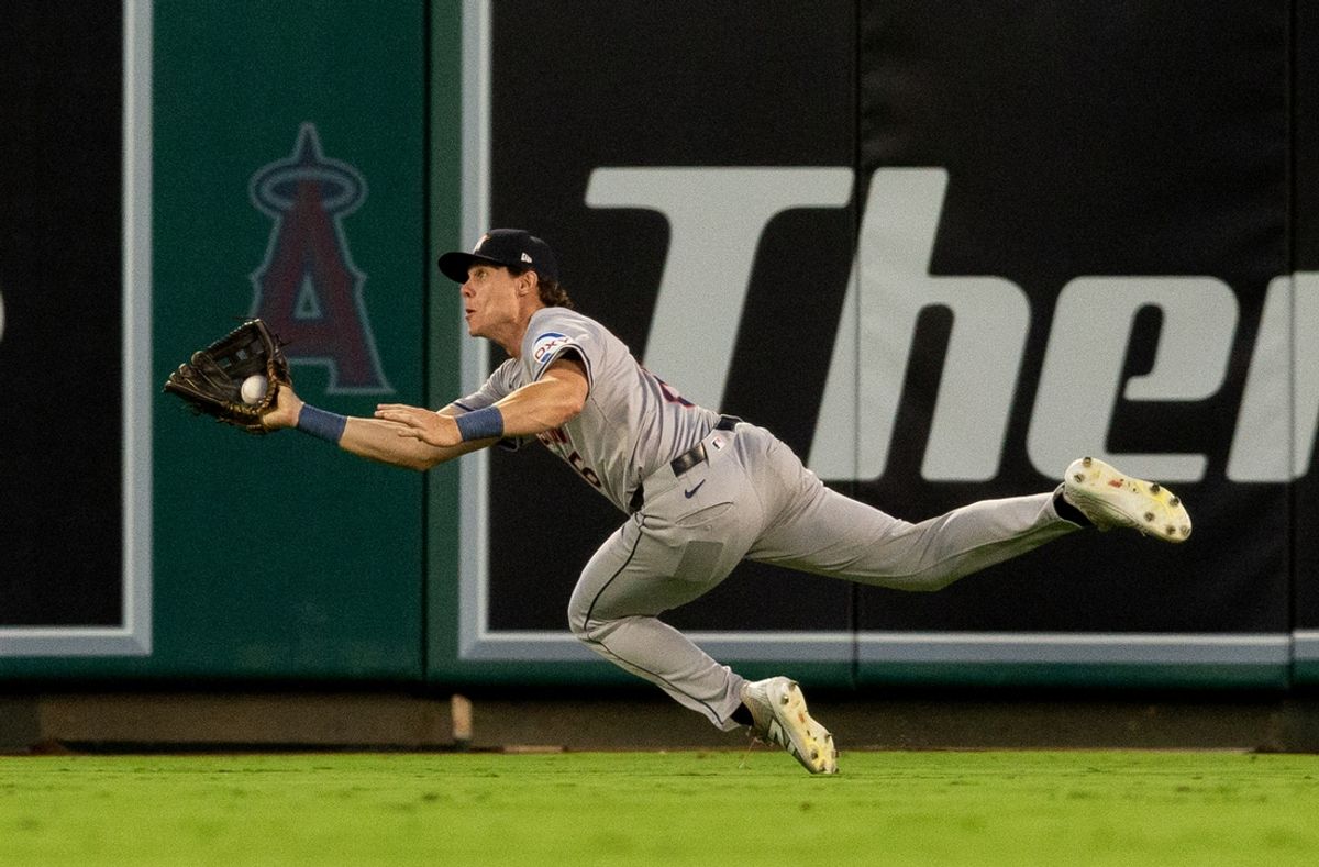 Sep 14, 2024; Anaheim, California, USA; Houston Astros outfielder Jake Meyers (6) makes a catch during the 1st inning against the Los Angeles Angels at Angel Stadium. Mandatory Credit: Jason Parkhurst-Imagn Images