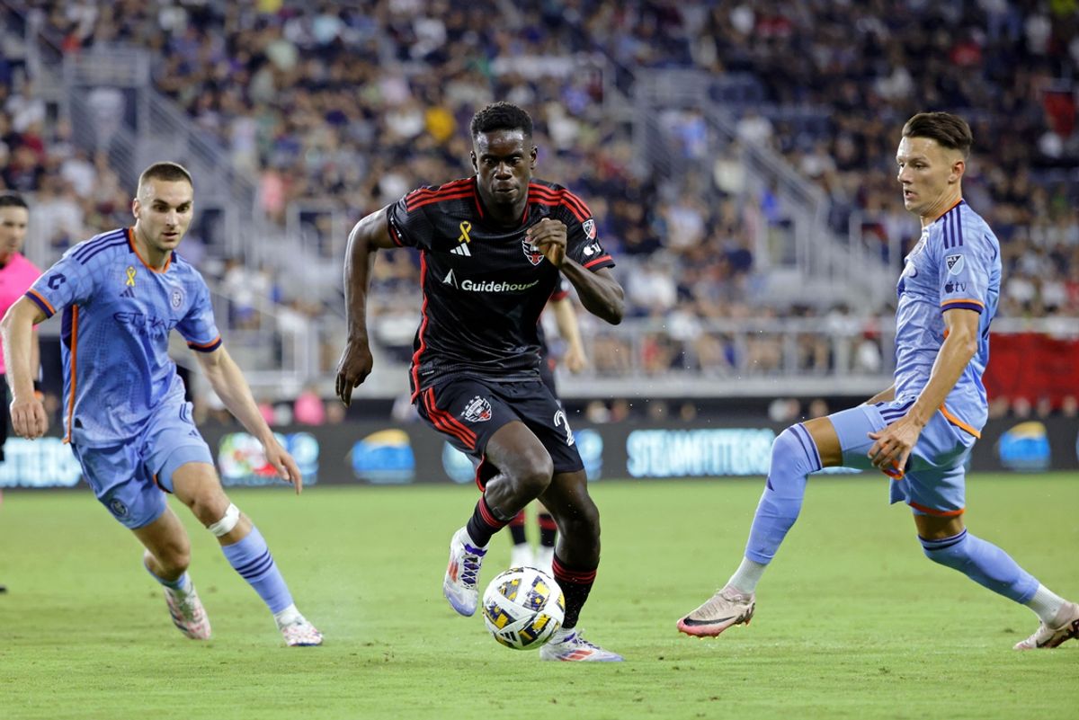 Sep 14, 2024; Washington, District of Columbia, USA; D.C. United forward Dominique Badji (23) dribbles the ball against New York City FC during the second half at Audi Field. Mandatory Credit: Amber Searls-Imagn Images