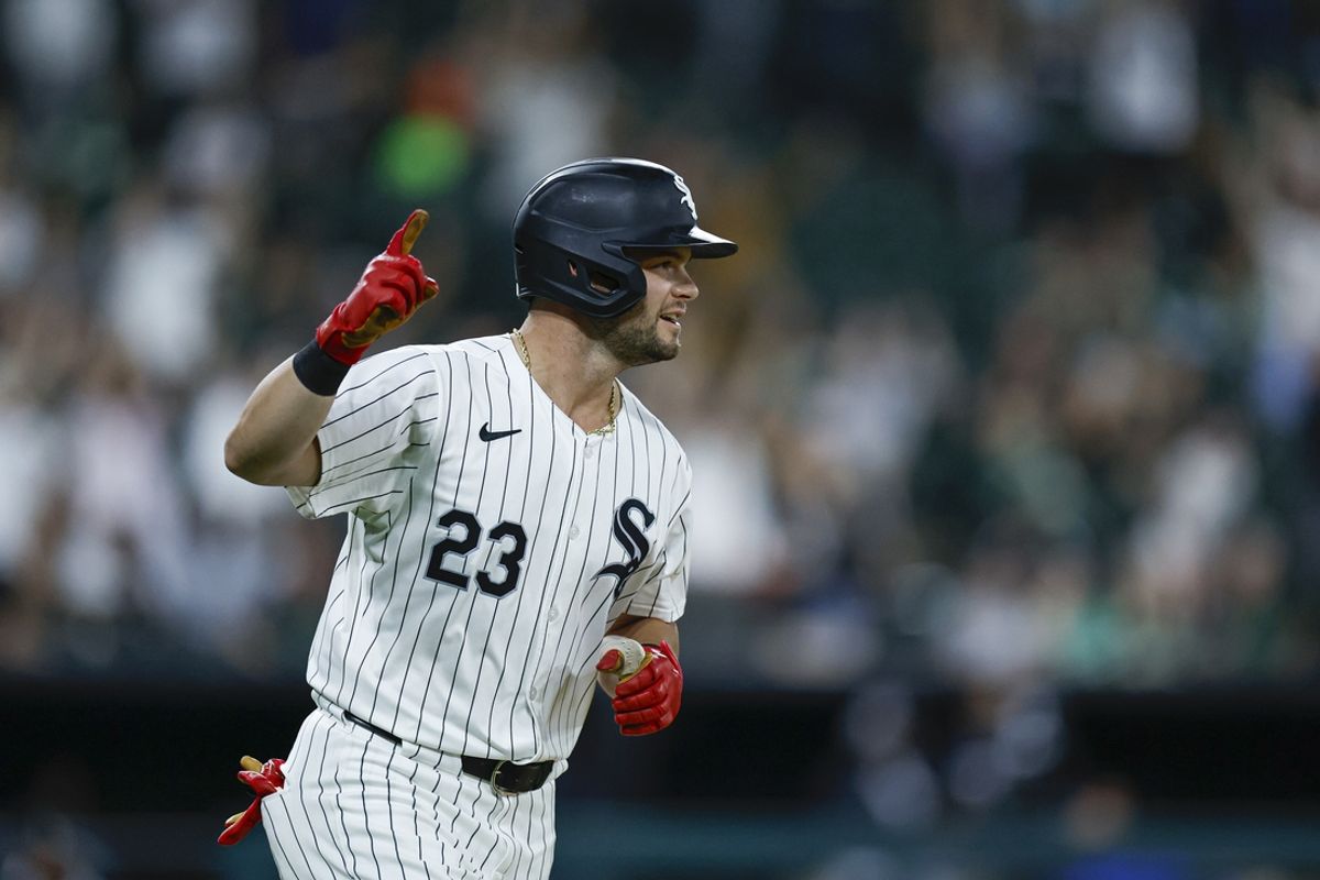 Sep 14, 2024; Chicago, Illinois, USA; Chicago White Sox outfielder Andrew Benintendi (23) celebrates as he rounds the bases after hitting a walk-off home run against the Oakland Athletics during the ninth inning at Guaranteed Rate Field. Mandatory Credit: Kamil Krzaczynski-Imagn Images