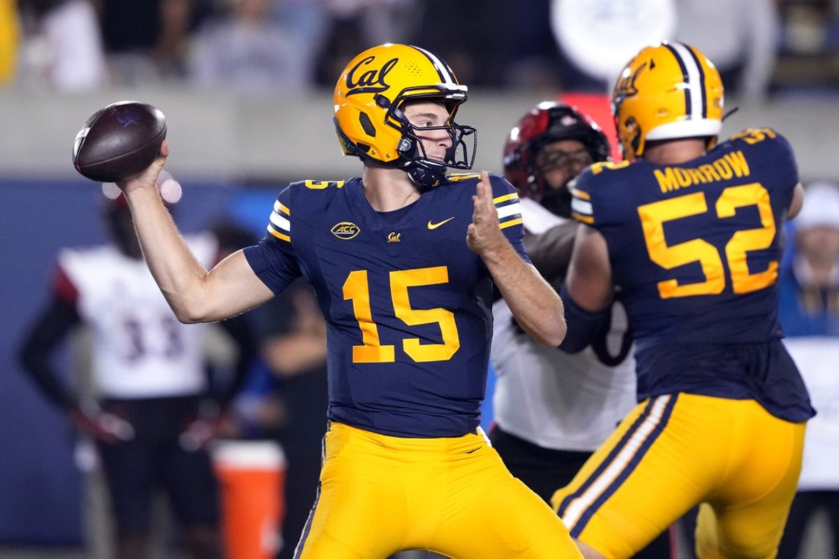 Sep 14, 2024; Berkeley, California, USA; California Golden Bears quarterback Fernando Mendoza (15) throws a pass against the San Diego State Aztecs during the first quarter at California Memorial Stadium. Mandatory Credit: Darren Yamashita-Imagn Images
