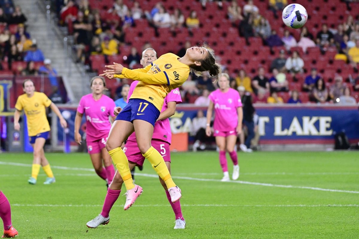 Sep 14, 2024; Sandy, Utah, USA; Utah Royals FC defender Ana Tejeda (17) heads the ball against San Diego Wave FC midfielder Emily van Egmond (5) in the first half at America First Field. Mandatory Credit: Peter Creveling-Imagn Images