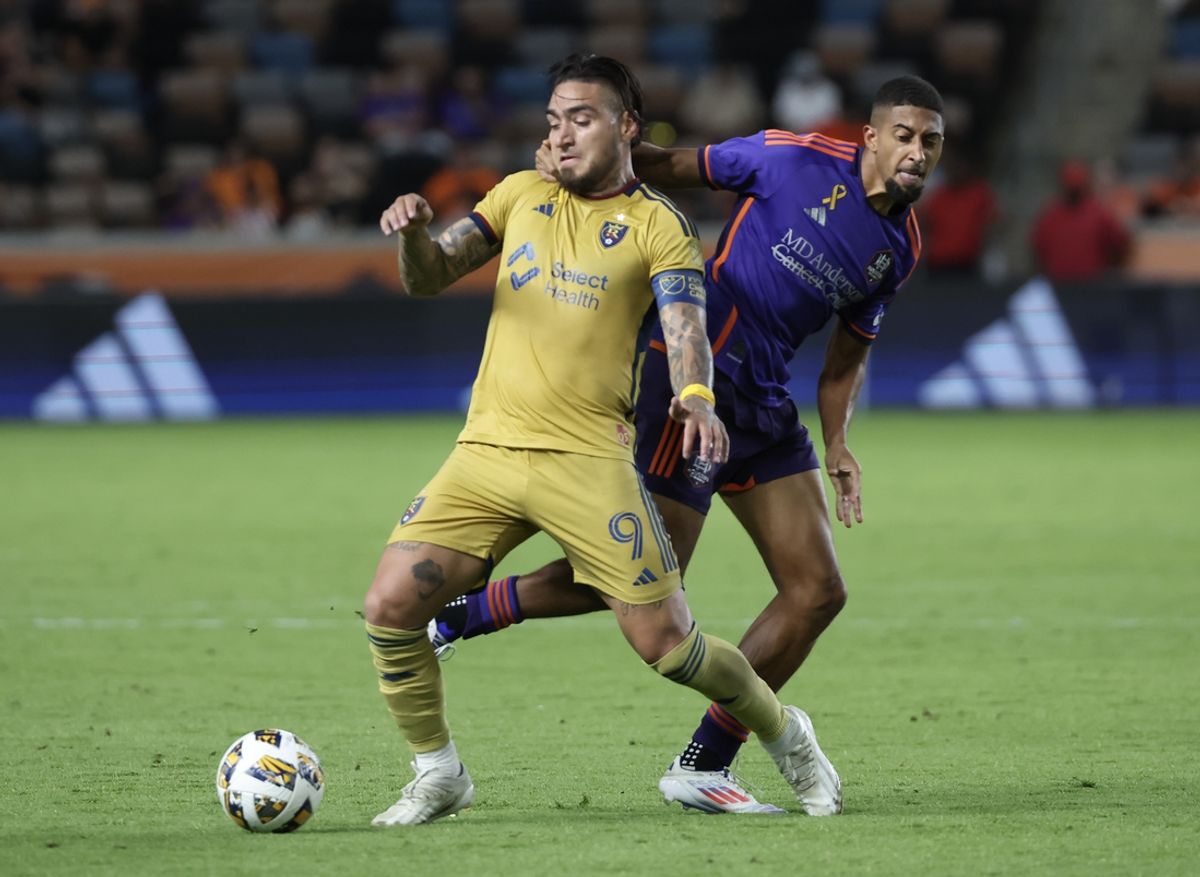Sep 14, 2024; Houston, Texas, USA; Houston Dynamo FC defender Obafemi Awodesu (41) battles Real Salt Lake forward Cristian Arango (9) at Shell Energy Stadium. Mandatory Credit: Thomas Shea-Imagn Images