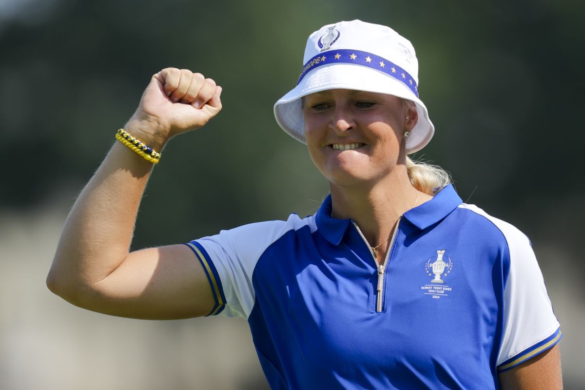 Sep 14, 2024; Gainesville, Virginia, USA; Anna Nordqvist of Team Europe reacts to making a putt on the 11th green during Fourball matches against Team USA during the second round of the Solheim Cup 2024 at Robert Trent Jones Golf Club. Mandatory Credit: Aaron Doster-Imagn Images