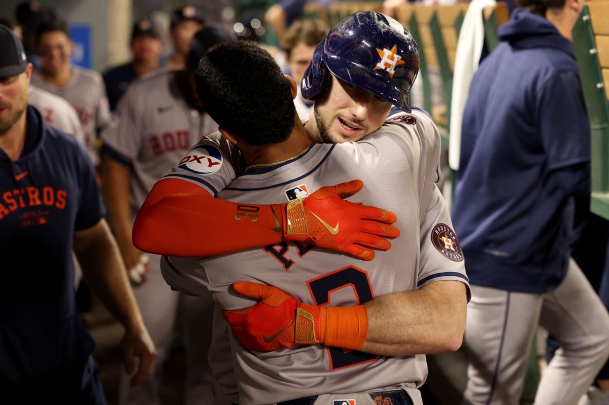 Sep 14, 2024; Anaheim, California, USA; Houston Astros outfielder Kyle Tucker (30) hugs shortstop Jeremy Pena (3) after hitting a home run during the 9th inning against the Los Angeles Angels at Angel Stadium. Mandatory Credit: Jason Parkhurst-Imagn Images