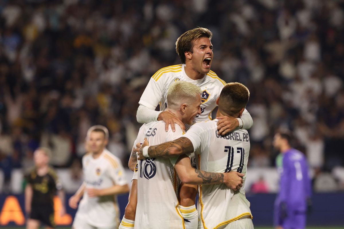 Sep 14, 2024; Carson, California, USA; Los Angeles Galaxy forward Gabriel Pec (11) celebrates goal with forward Jonathan Perez (18) and midfielder Riqui Puig (10) second half at Dignity Health Sports Park. Mandatory Credit: Kiyoshi Mio-Imagn Images