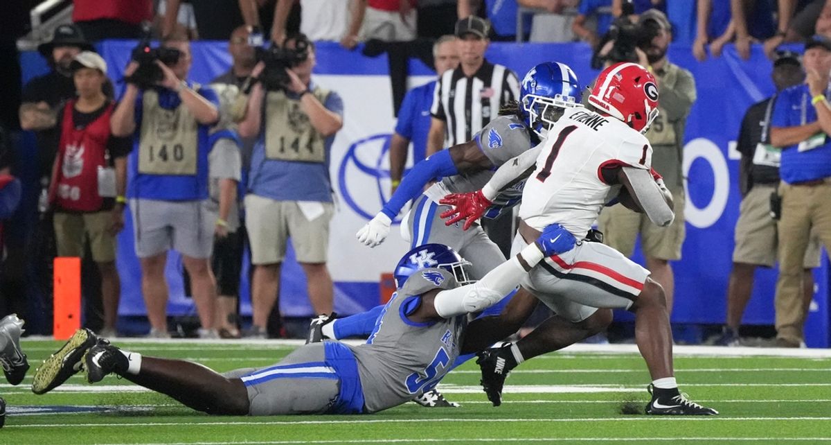 Kentucky’s Gerald Mincey sacks Georgia’s Trevor Etienne Saturday night at Kroger Field.
Sept. 14, 2024