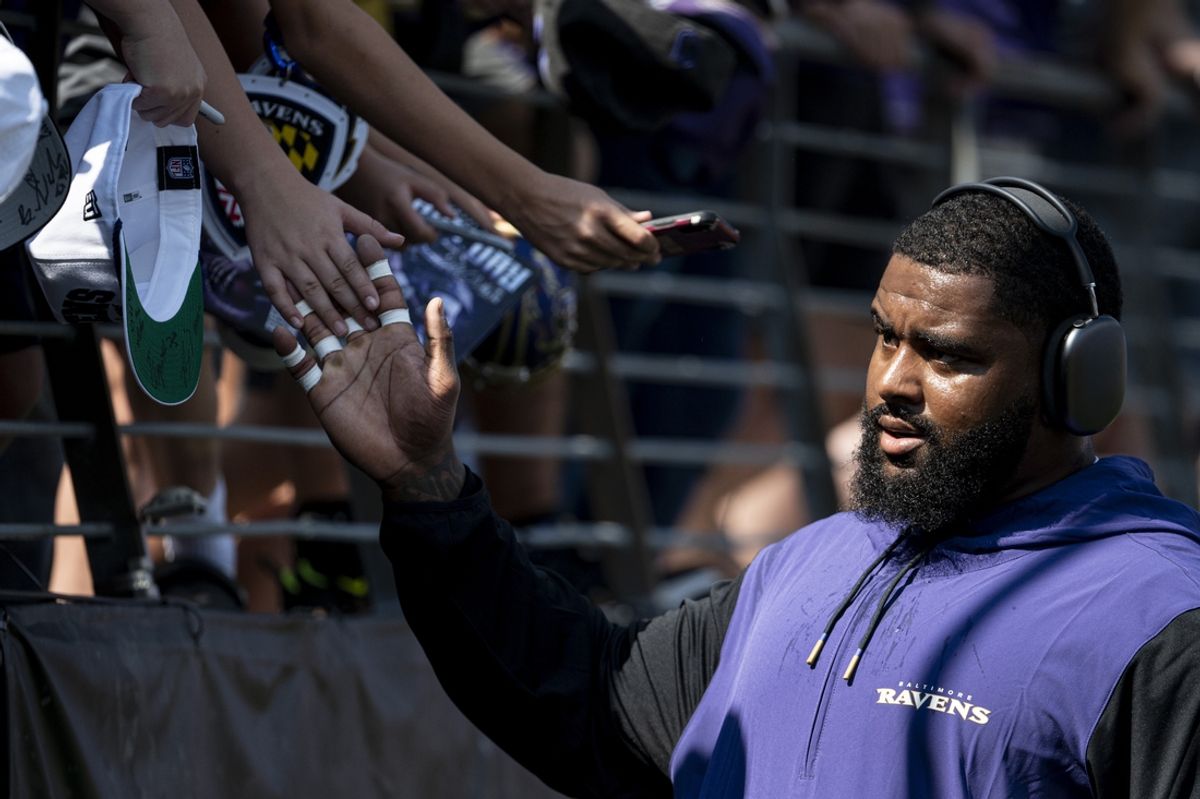 Sep 15, 2024; Baltimore, Maryland, USA;  Baltimore Ravens defensive tackle Broderick Washington (96) high fives fans before the game against the Las Vegas Raiders at M&T Bank Stadium. Mandatory Credit: Tommy Gilligan-Imagn Images
