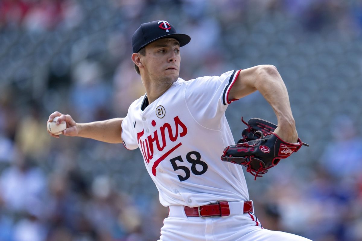 Sep 15, 2024; Minneapolis, Minnesota, USA; Minnesota Twins starting pitcher David Festa (58) delvers a pitch against the Cincinnati Reds in the first inning at Target Field. Mandatory Credit: Jesse Johnson-Imagn Images
