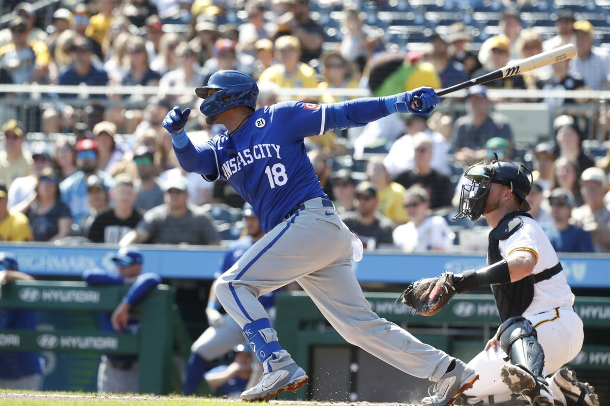 Sep 15, 2024; Pittsburgh, Pennsylvania, USA;  Kansas City Royals first baseman Yuli Gurriel (18) drives in a run with a sacrifice fly against the Pittsburgh Pirates during the second inning at PNC Park. Mandatory Credit: Charles LeClaire-Imagn Images