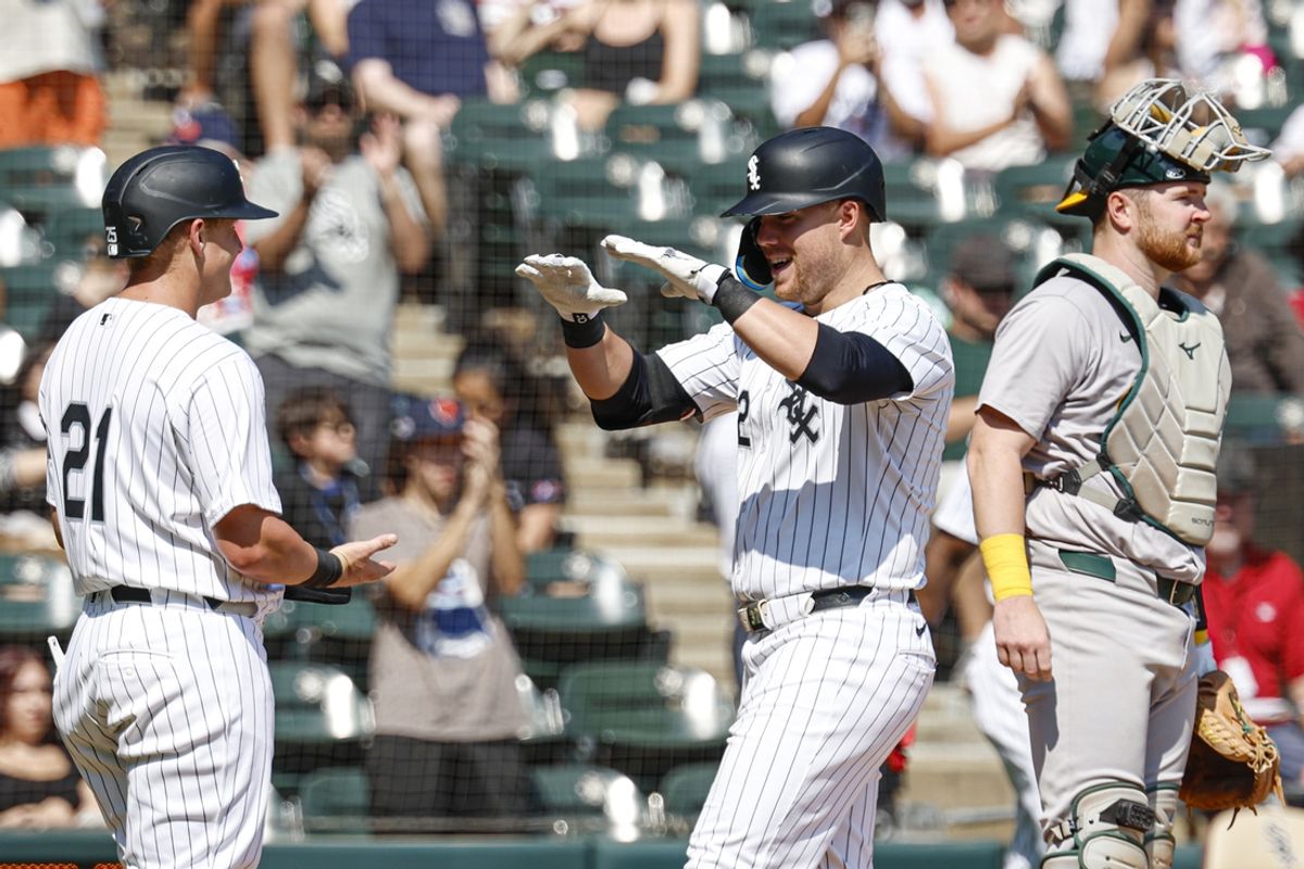 Sep 15, 2024; Chicago, Illinois, USA; Chicago White Sox outfielder Gavin Sheets (32) celebrates with first baseman Andrew Vaughn (21) after hitting a two-run home run against the Oakland Athletics during the first inning at Guaranteed Rate Field. Mandatory Credit: Kamil Krzaczynski-Imagn Images