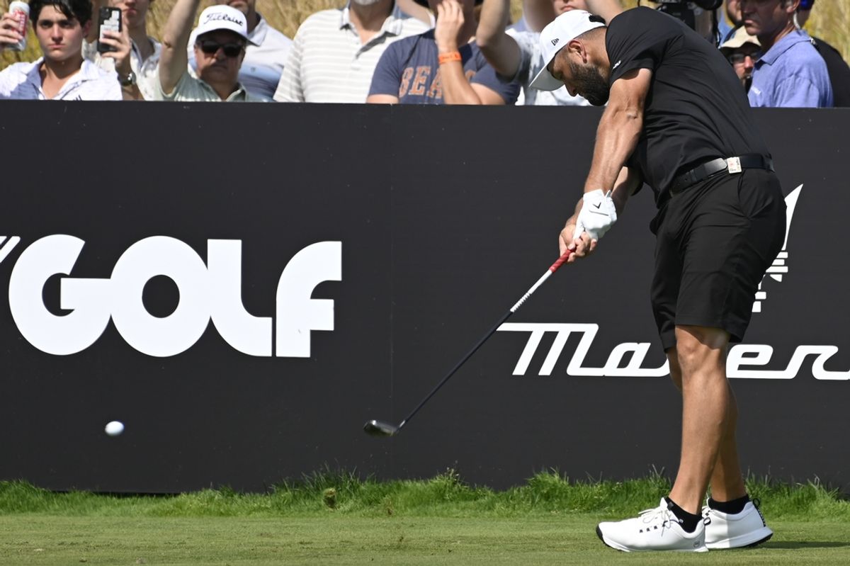 Sep 15, 2024; Bolingbrook, Illinois, USA; Jon Rahm of the Legion XIII on tees off on the second  hole during the final round of the LIV Golf Chicago tournament at Bolingbrook Golf Club. Mandatory Credit: Matt Marton-Imagn Images