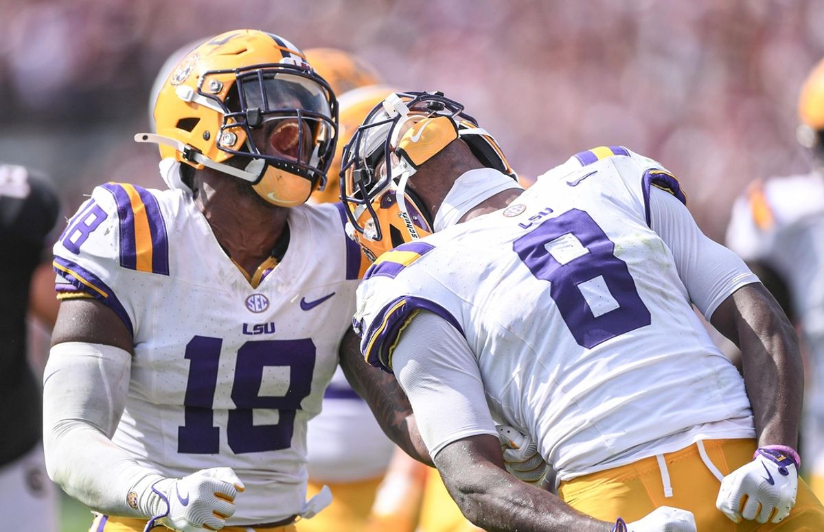 Louisiana State University safety Major Burns (8) and linebacker Greg Penn III (18) react after sacking South Carolina quarterback Robby Ashford (1) during the fourth quarter at Williams-Brice Stadium in Columbia, S.C. Saturday, September 14, 2024.