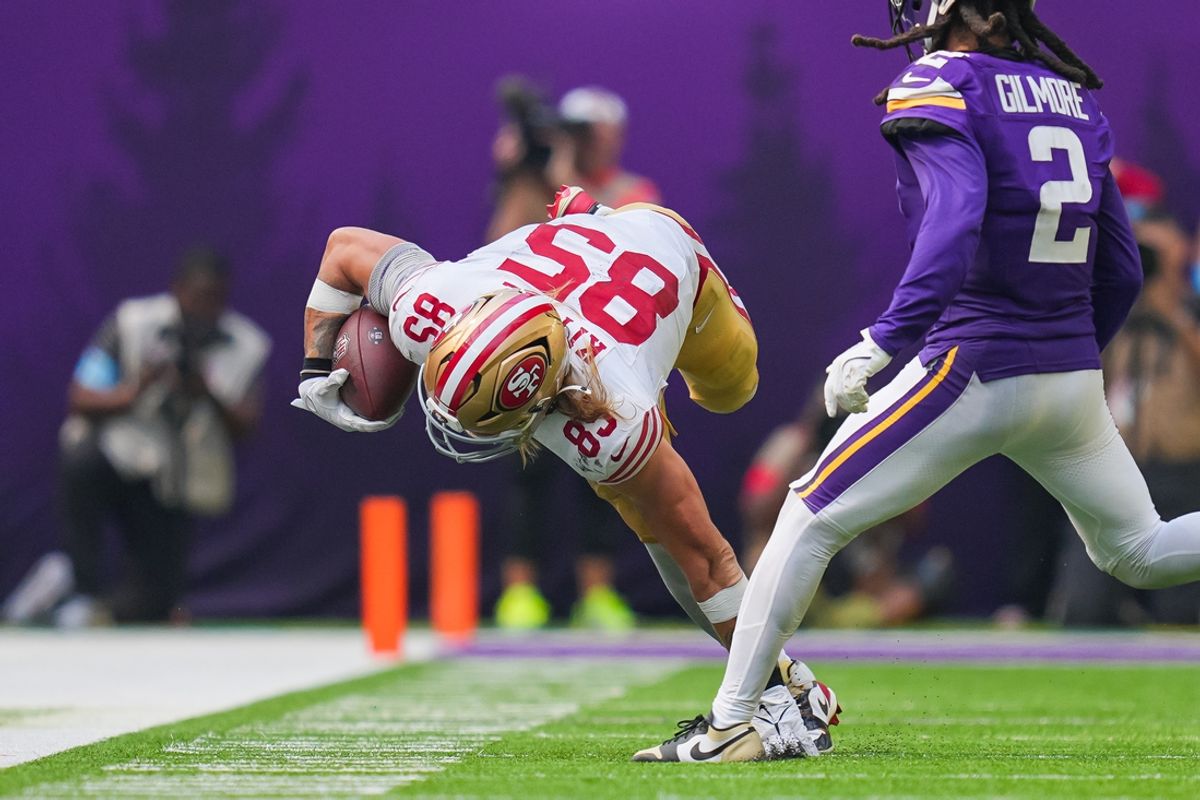Sep 15, 2024; Minneapolis, Minnesota, USA; San Francisco 49ers tight end George Kittle (85) is tackled against the Minnesota Vikings in the fourth quarter at U.S. Bank Stadium. Mandatory Credit: Brad Rempel-Imagn Images