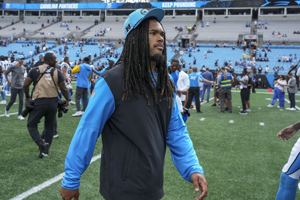 Sep 15, 2024; Charlotte, North Carolina, USA;  Carolina Panthers running back Jonathon Brooks (24) walks off the field after the second half against the Los Angeles Chargers at Bank of America Stadium. Mandatory Credit: Jim Dedmon-Imagn Images