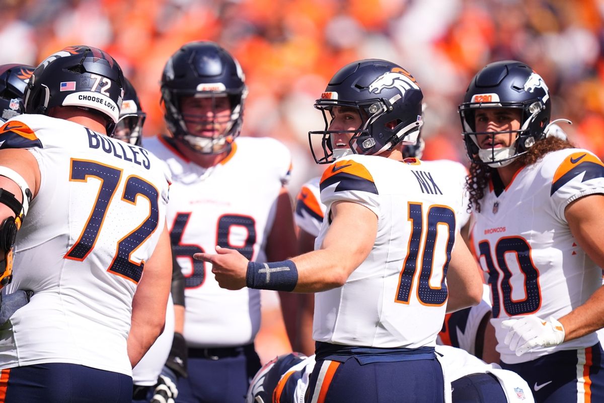 Sep 15, 2024; Denver, Colorado, USA; Denver Broncos quarterback Bo Nix (10) huddles with teammates in the first quarter against the Pittsburgh Steelers at Empower Field at Mile High. Mandatory Credit: Ron Chenoy-Imagn Images